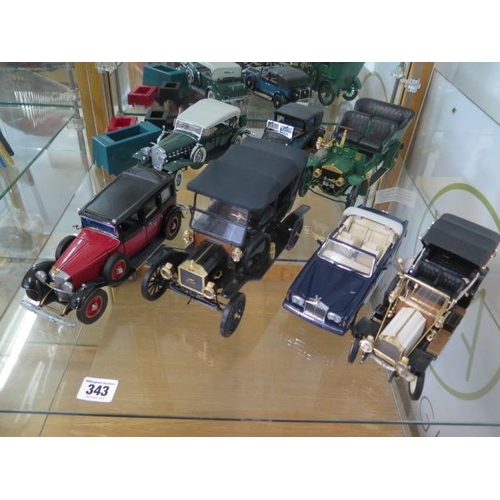 343 - Six Franklin Mint vintage motor car models and a Classic Cars 1932 Danbury Mint Cadillac with bookle... 