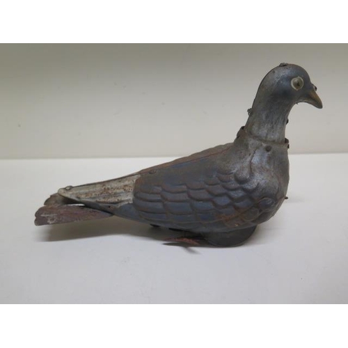 350 - A French tinplate clockwork pigeon by V.B. & Cie a Paris - Length 19cm - some rusting to body, mecha... 