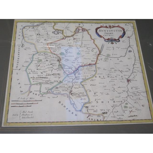 386 - A Robert Morden coloured map of Huntingdonshire in a gilt frame, frame size 57cm x 61cm