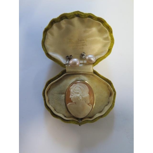 39 - A pair of 18ct gold pearl and diamond earrings and a 9ct mounted cameo brooch