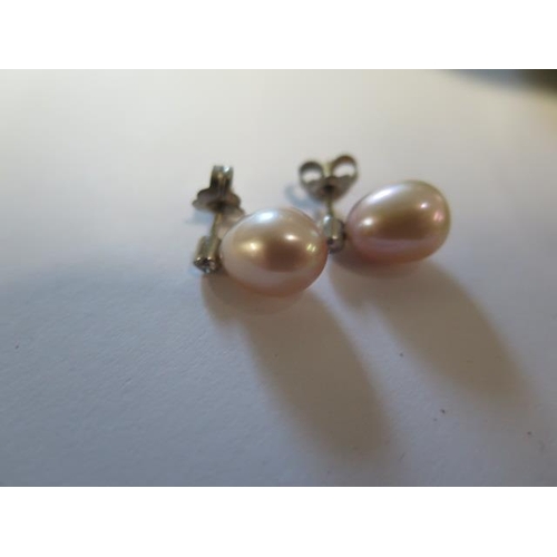 39 - A pair of 18ct gold pearl and diamond earrings and a 9ct mounted cameo brooch