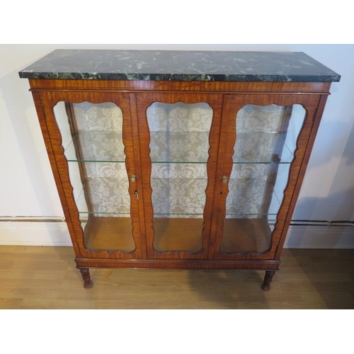 538 - A satin walnut marble top two door glazed display cabinet - Height 122cm x 108cm x 37cm