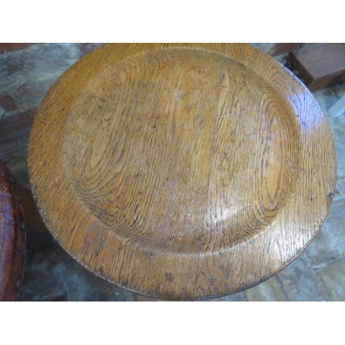 540 - Three oak stools with a Gaskell & Chambers Ltd plaque - one with an upholstered top, the other two w... 