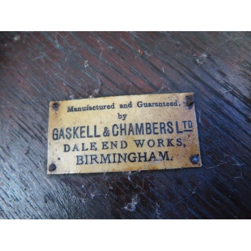 540 - Three oak stools with a Gaskell & Chambers Ltd plaque - one with an upholstered top, the other two w... 