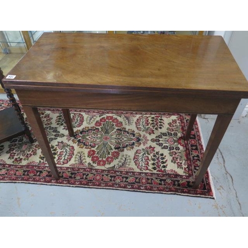 541 - A Georgian mahogany rectangular fold over top tea table - 74cm x 90cm x 44cm (closed)