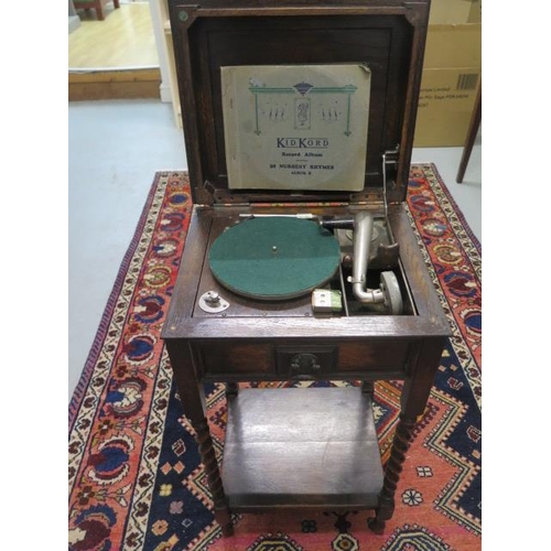 542 - A rare oak case gramophone by The Perophone Company London, The Grippa Portable, together with an al... 