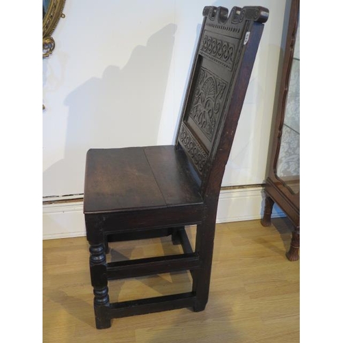 544 - An antique oak solid seated chair with all round square stretchers - Height 103cm x Width 50cm - goo... 