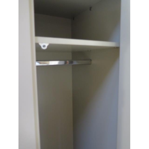 558 - A good quality painted two door wardrobe with a base drawer - generally good condition, some small m... 