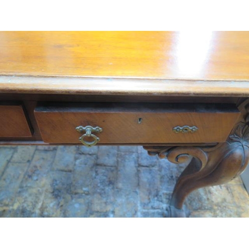 566 - A late Victorian mahogany six drawer oval table on carved cabriole legs - Height 73cm x 150cm x 100c... 