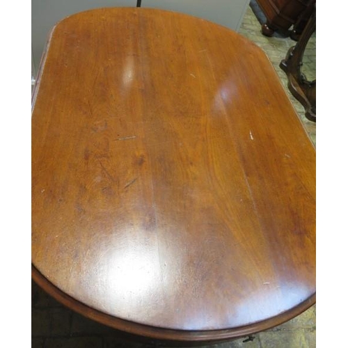 566 - A late Victorian mahogany six drawer oval table on carved cabriole legs - Height 73cm x 150cm x 100c... 