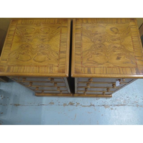 568 - A pair of burr oak bedside chests with a slide above four drawers made by a local craftsman to a hig... 