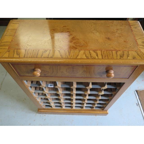 569 - A new burr oak 36 bottle wine rack with a drawer - Height 92cm x 70cm x 28cm