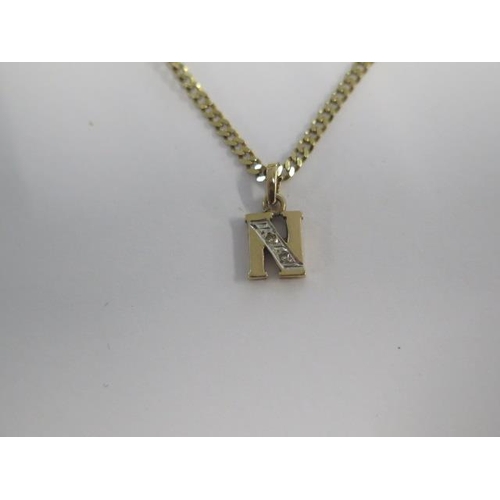 6 - A 9ct yellow gold N pendant on 9ct gold 42cm chain - approx weight 3.5 grams