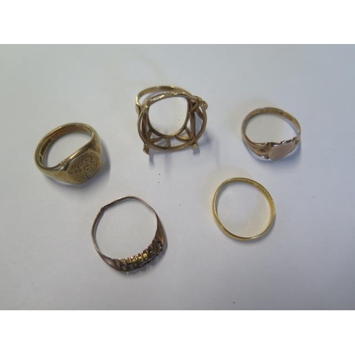 65 - Four 9ct gold rings - missing stones - approx weight 14 grams - and a 22ct band ring - approx weight... 