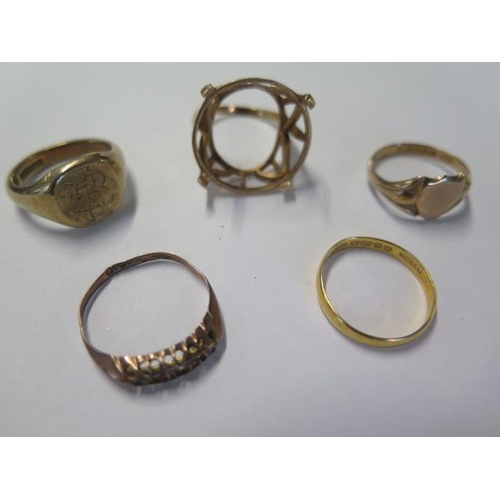 65 - Four 9ct gold rings - missing stones - approx weight 14 grams - and a 22ct band ring - approx weight... 