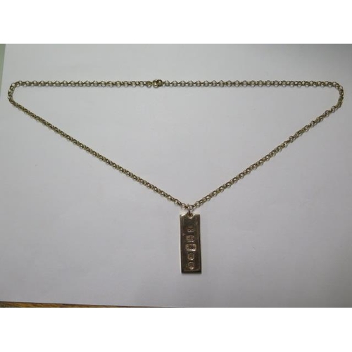 68 - A 9ct yellow gold ingot pendant on a 60cm 9ct chain approx weight 44 grams