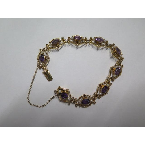 69 - A 15ct yellow gold amethyst and pearl bracelet - approx weight 17.5 grams - in good condition