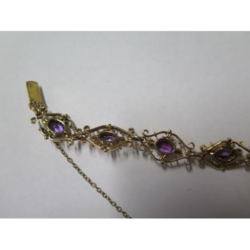 69 - A 15ct yellow gold amethyst and pearl bracelet - approx weight 17.5 grams - in good condition