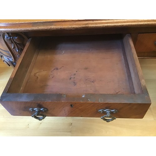 566 - A late Victorian mahogany six drawer oval table on carved cabriole legs - Height 73cm x 150cm x 100c... 