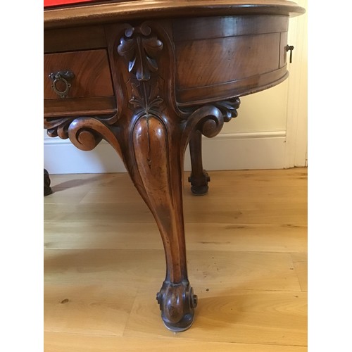 566 - A late Victorian mahogany six drawer oval table on carved cabriole legs - Height 73cm x 150cm x 100c... 