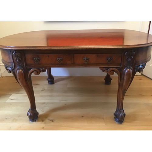 566 - A late Victorian mahogany six drawer oval table on carved cabriole legs - Height 73cm x 150cm x 100c... 