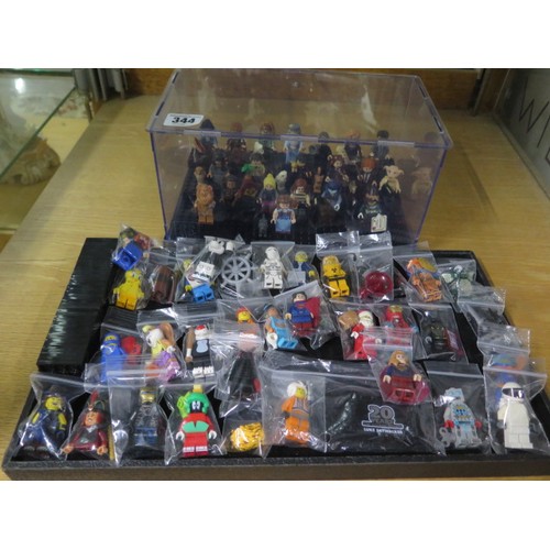 344 - A collection of 20 Lego mini figures in a case - 17 Harry Potter/Fantastic Beasts and three Wizard o... 