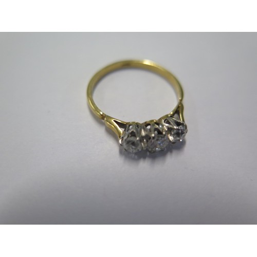 73 - An 18ct yellow gold three stone diamond ring size O approx 2gs