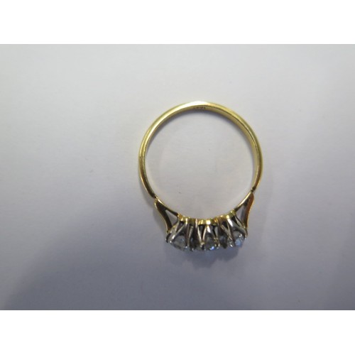 73 - An 18ct yellow gold three stone diamond ring size O approx 2gs