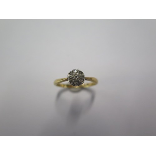 74 - An 18ct yellow gold cluster ring size L approx 1.9 gs