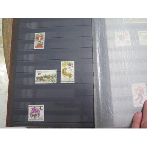 276 - A large collection of World stamps in 20 albums and some loose including 1st day covers