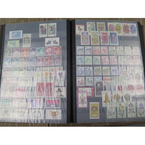 276 - A large collection of World stamps in 20 albums and some loose including 1st day covers