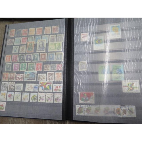 276 - A large collection of World stamps in 20 albums and some loose including 1st day covers