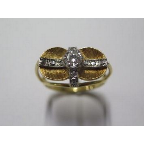 22 - An unusual yellow gold diamond ring, the central diamond approx 0.25ct, tests to approx 15/18ct - ap... 