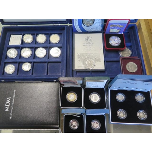 233 - A collection of silver coins to include 9 commemorative Chinese coins, 2004 United Kingdom silver Pa... 