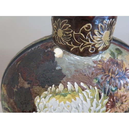 273 - A floral decorated hand painted moon shaped vase 35cm tall x 31 cm wide, overall crazing, some flaki... 