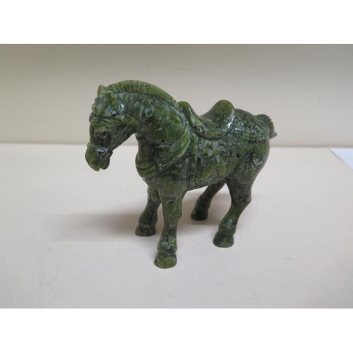 284 - A jade type green horse - Height 12cm