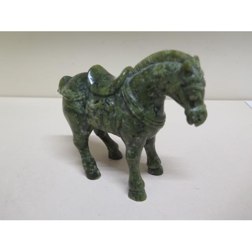 284 - A jade type green horse - Height 12cm