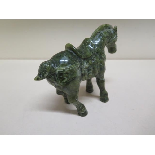 284 - A jade type green horse - Height 12cm