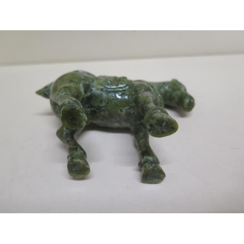 284 - A jade type green horse - Height 12cm