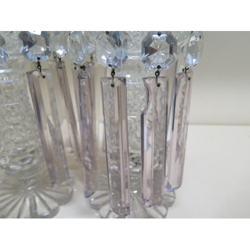 285 - A pair of clear glass lustres - Height 22cm - chips to one body and some replacement drops - some ch... 