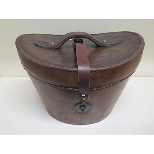 288 - A Victorian leather top hat box with a tall brushed silk top hat - approx size 7 and a collapsible o... 