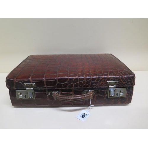 289 - A vintage crocodile correspondence/attache case with fitted interiors - 37cm x 24cm x 11cm - with ol... 