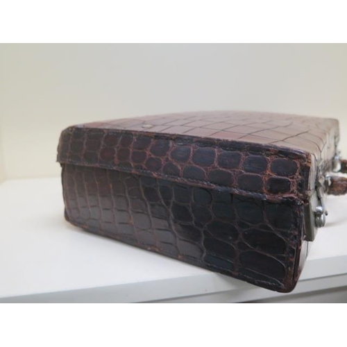 289 - A vintage crocodile correspondence/attache case with fitted interiors - 37cm x 24cm x 11cm - with ol... 