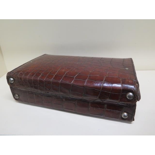 289 - A vintage crocodile correspondence/attache case with fitted interiors - 37cm x 24cm x 11cm - with ol... 