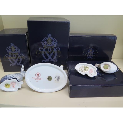 306 - Two boxed Royal Crown Derby paperweights, Starlight Hare, Freisian Cow and two boxed Members packs p... 