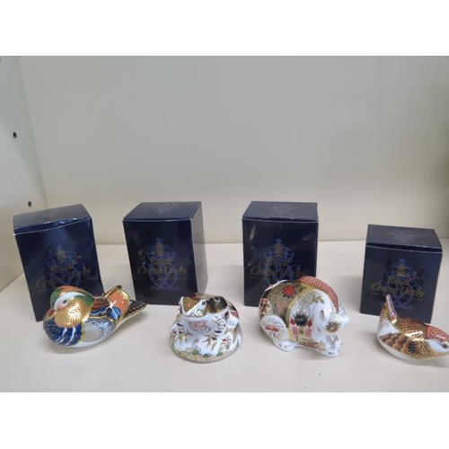 313 - Four boxed Royal Crown Derby paperweights, Mandarin duck, Old Imari Frog, Rocky Mountain Bear, and W... 