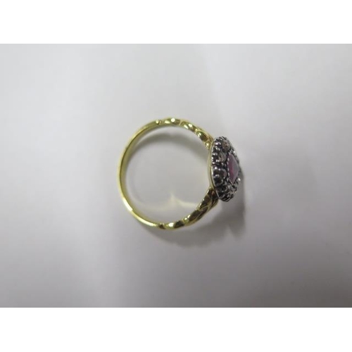 33 - A 15ct yellow gold (tested) ruby and rose cut diamond ring - head size approx 13.5mm x 11mm - ring s... 