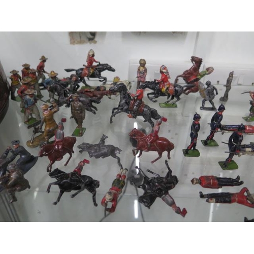 334 - A collection of lead figures, many Britain's