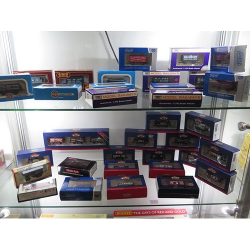 337 - A collection of 31 boxed 00 gauge Airfix, Dapol, Bachmann rolling stock, a Model Rail Sentinel loco,... 