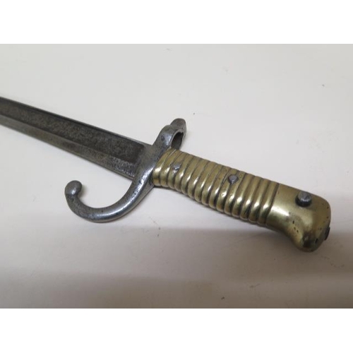 366 - A 19th century curved bayonet - Length 69cm